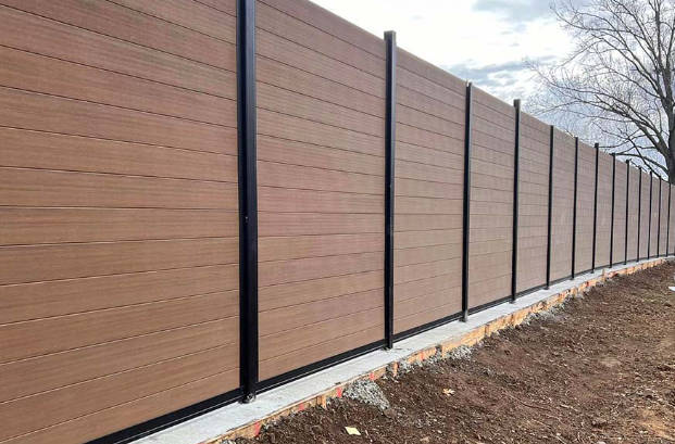 Modular composite fence panels with steel posts