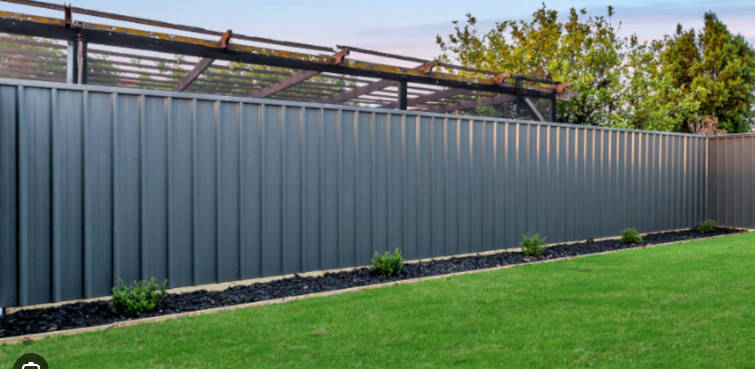 Grey Colorsteel fence panels in a low maintenance backyard